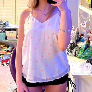 white top with pink lips